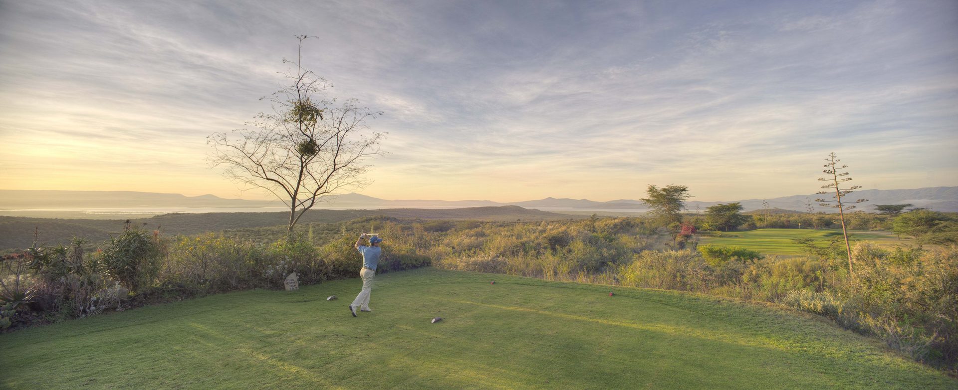 Great Rift Valley course on the escarpment above Lake Naivasha, zebra on fairway