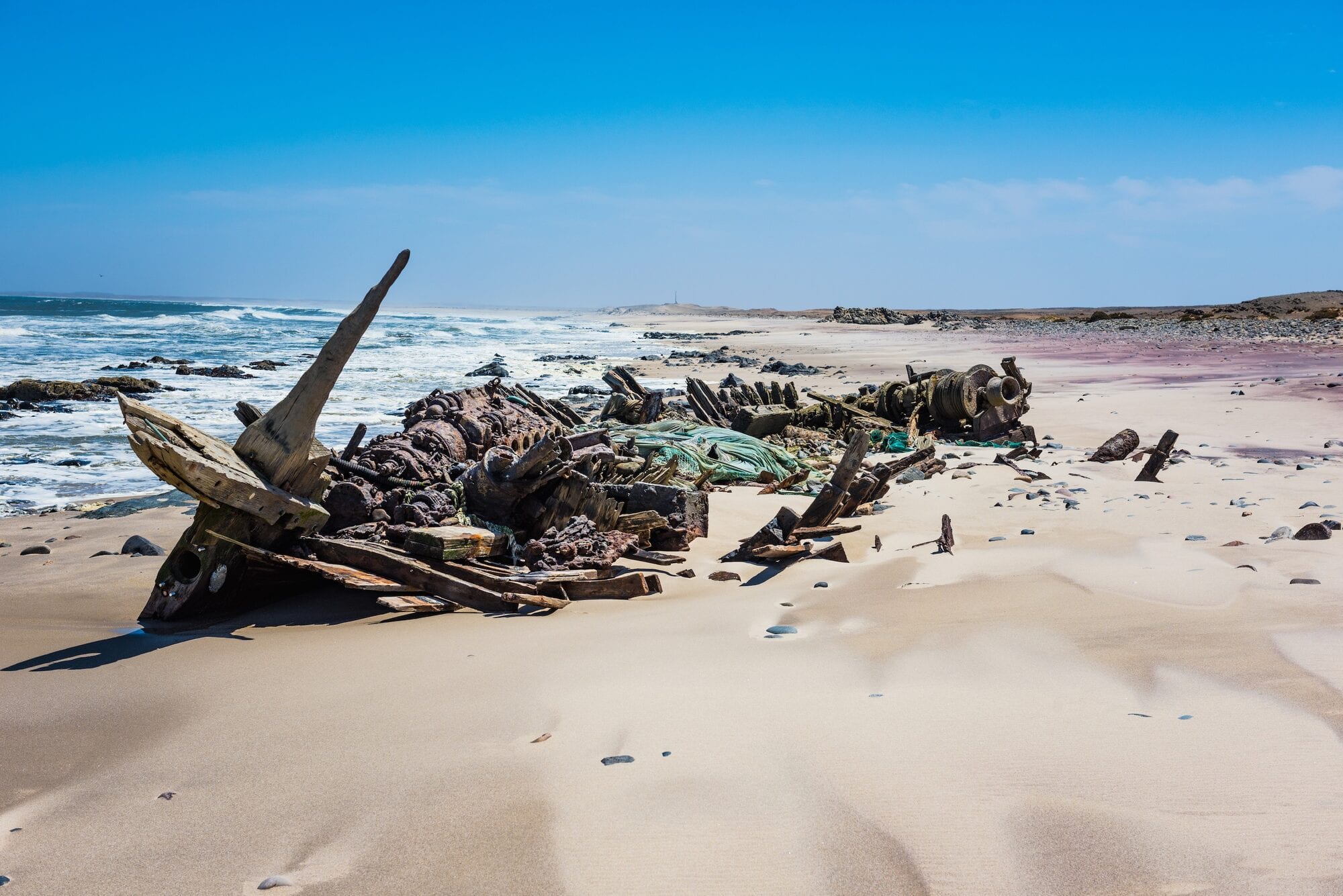 Shipwreck on the fogged Skeleton Coast shoreline from the air